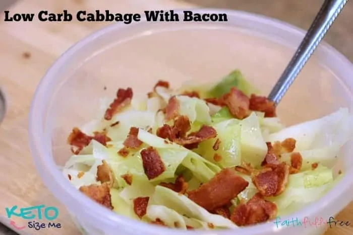 Keto Cabbage With Bacon in a clear plastic bowl with a fork