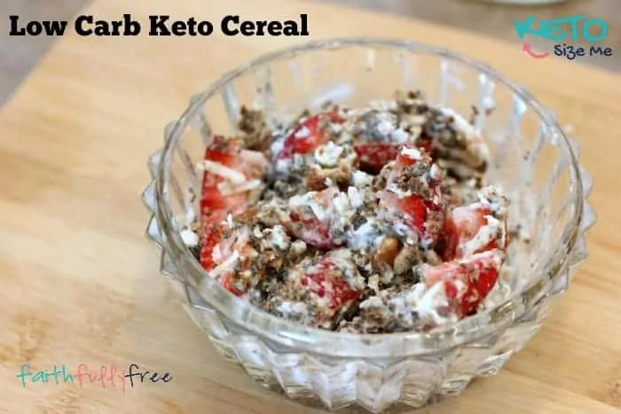 keto cereal with coconut milk and strawberries in a glass bowl