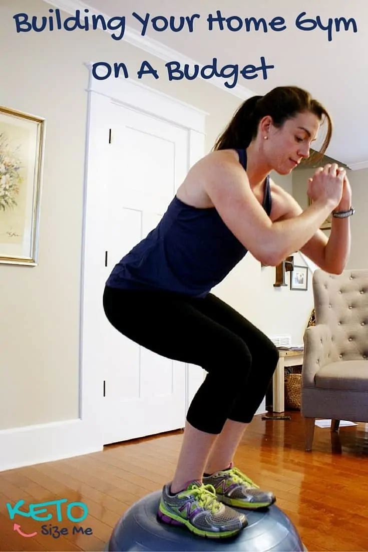 Woman balancing on a bosu ball in home gym
