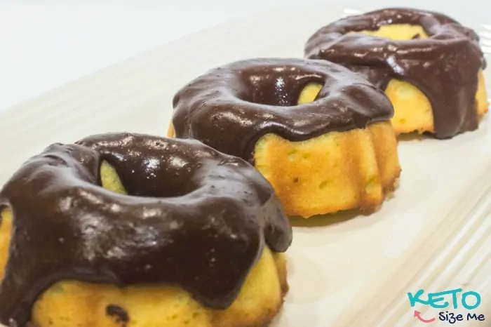 Three chocolate glazed low carb donuts 