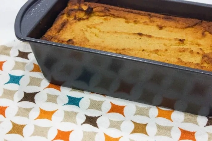 loaf pan containing cooked pumpkin bread
