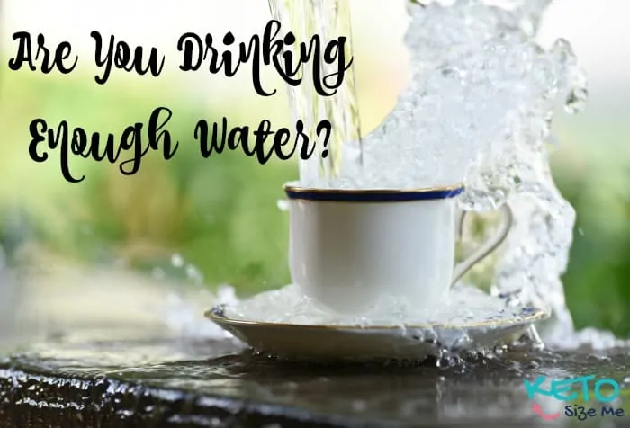 text says are you drinking enough water image is a mug with water splashing out of it