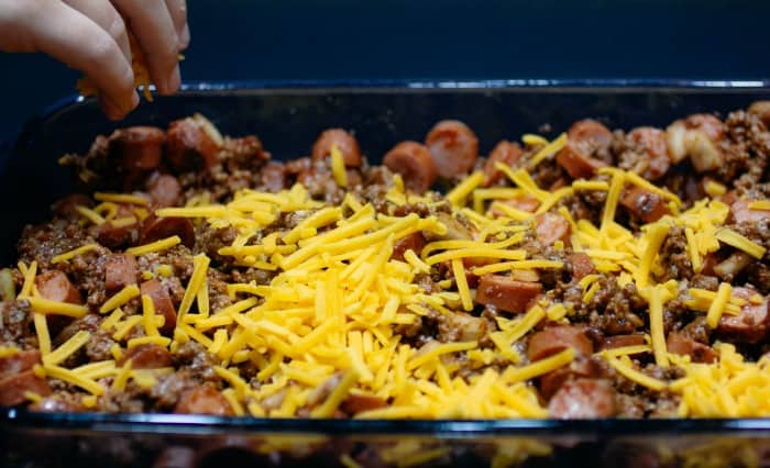 Low Carb High Fat Keto Chili Cheese Dog Casserole. Ground beef, hot dogs, homemade chili, and cheese baked to perfection.