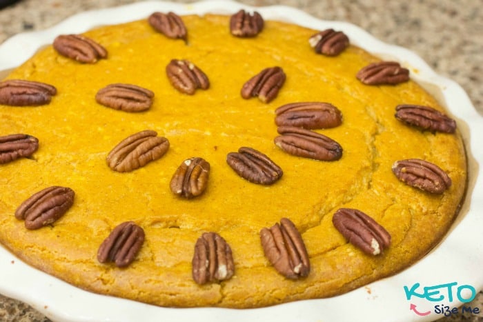 keto pumpkin cheesecake topped with pecans