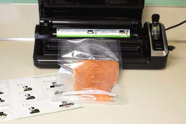Food saver sealing salmon