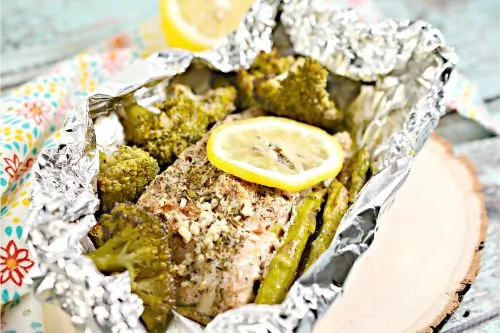 keto salmon in aluminum foil on a plate 